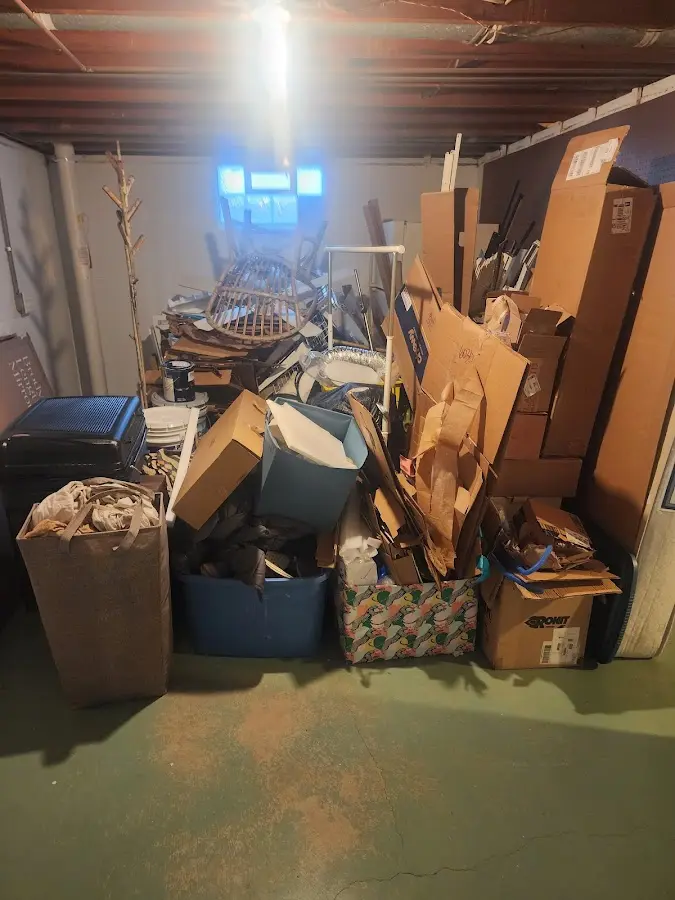 Roll-off dumpster container at job site for Construction Dumpster Rental in Bay St. Louis